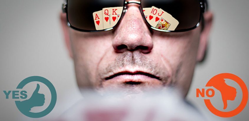 Man Wearing Sunglasses with Cards Reflected