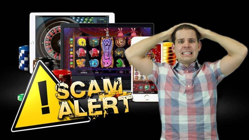 Online Casino - Casino Chips - Tablets and Smartphones - Scam Alert - Guy Looking Nervous
