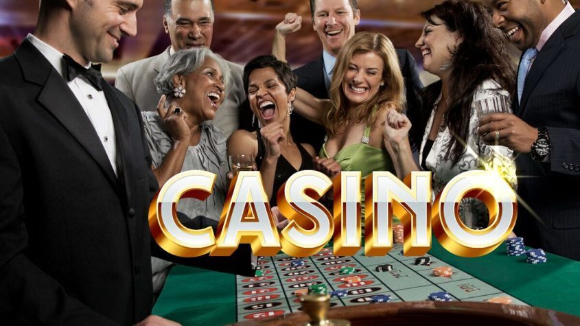 People Playing at Casino Table