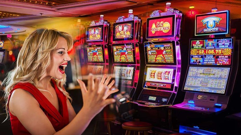 Slot Machines at a Casino, Woman Excited