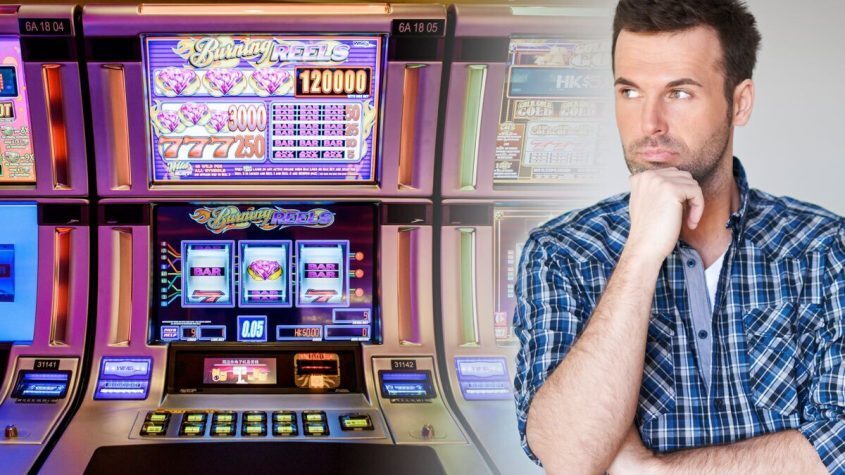 Man thinking about slot machine