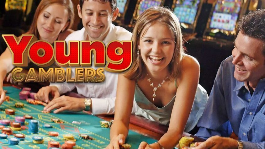 Young People Gathered at Casino Gaming Table